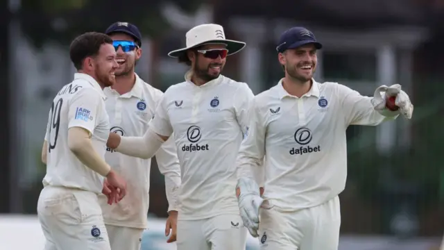 Middlesex celebrate a Leicestershire wicket