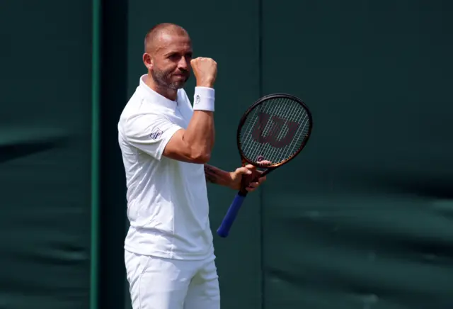 Dan Evans celebrates victory