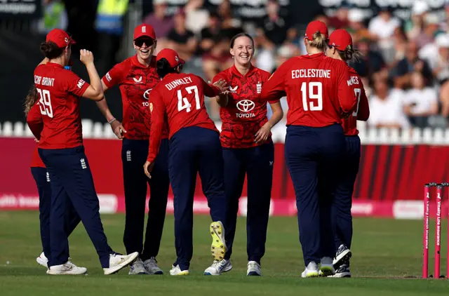 Lauren Filer of England celebrates taking the wicket of Shafali Verma of India