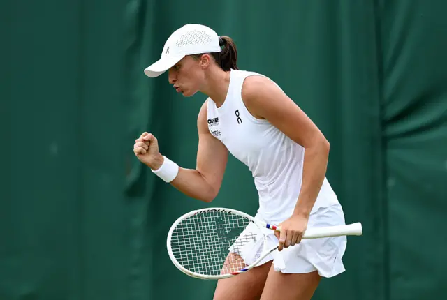 Iga Swiatek celebrates at Wimbledon