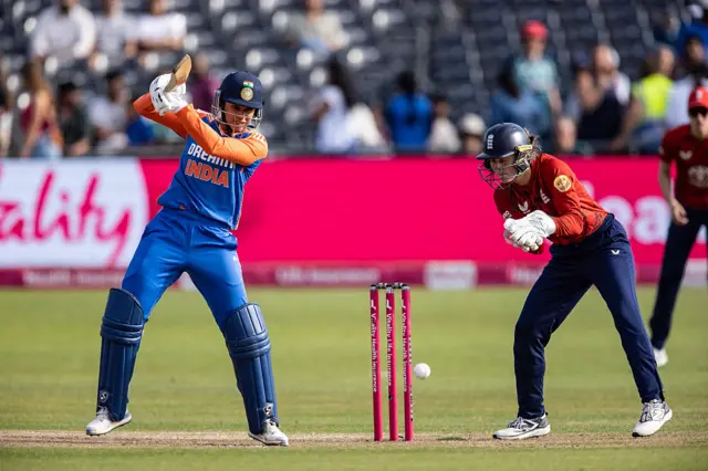 Smriti Mandhana of India hits the ball to the boundary