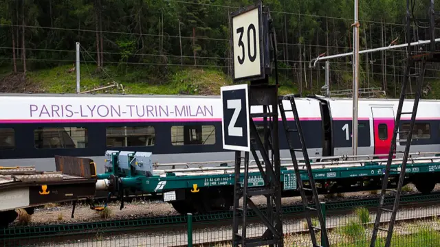 A InOui train linking Paris-Lyon-Turin and Milan passes the train station at Modane, in the southern Savoy region of France