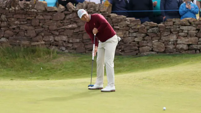 Adam Scott in action