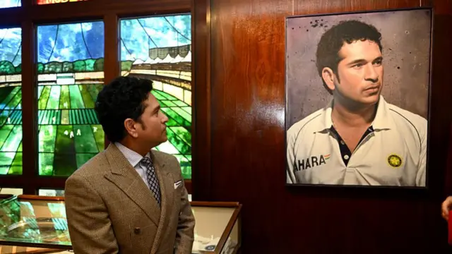 Sachin Tendulkar with a his portrait at Lord's