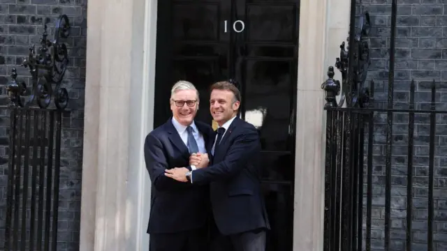 Keir Starmer greets France's President Emmanuel Macron