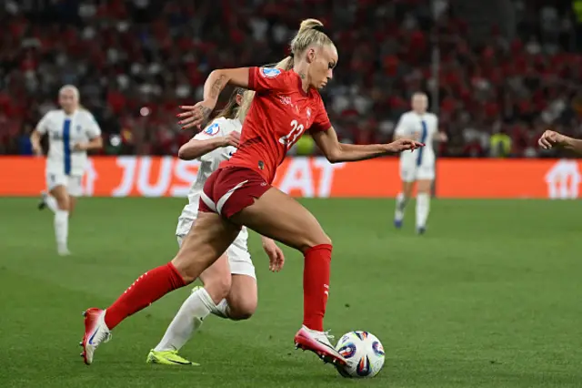 Alisha Lehmann runs with the ball