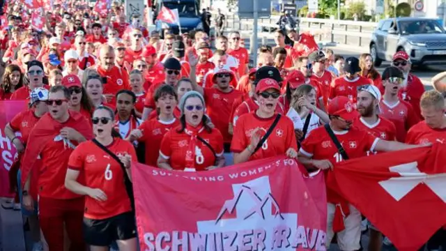 Swiss fans march together