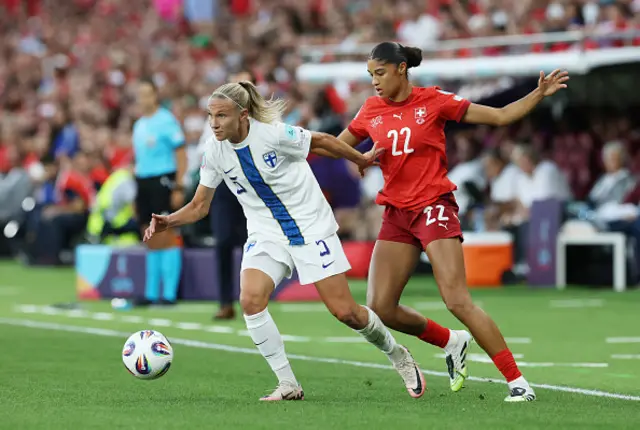 Emma Koivisto of Finland battles for possession with Sydney Schertenleib