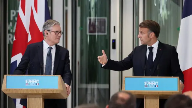Britain's Prime Minister Keir Starmer and France's President Emmanuel Macron address a joint press conference following a meeting of the Coalition of the Willing at a military base at Northwood Headquarters in north-west London, Britain, on July 10