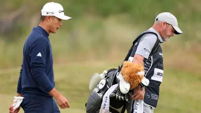 Collin Morikawa and caddie Billy Foster