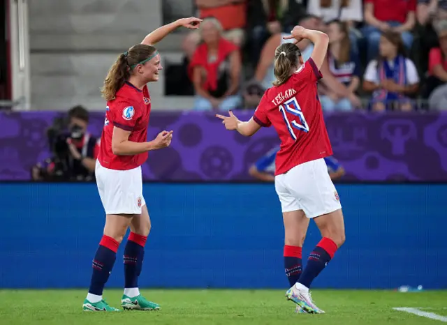 Signe Gaupset of Norway celebrates with teammate Elisabeth Terland
