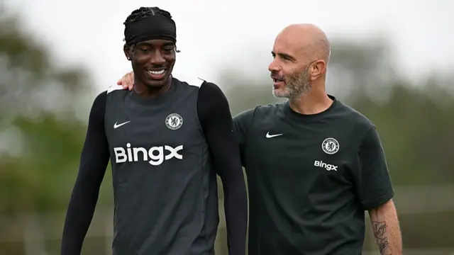 Noni Madueke and head coach Enzo Maresca