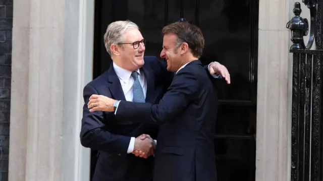 Starmer and Macron embrace outside No 10's black door