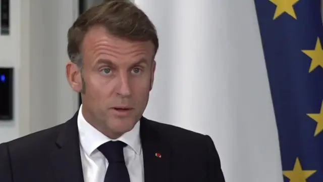 Macron speaking during a joint conference