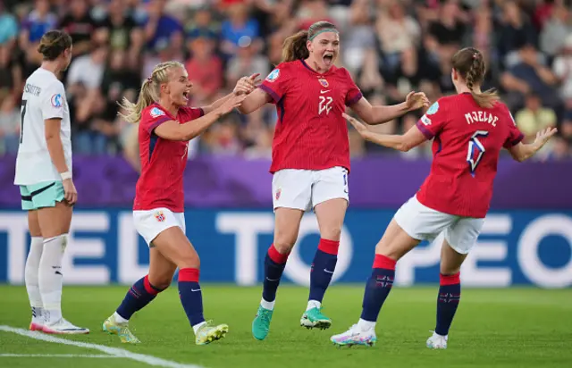 Signe Gaupset of Norway celebrates with teammates Emilie Woldvik and Maren Mjelde