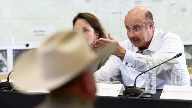 Television personality Dr. Phil McGraw speaks during a roundtable