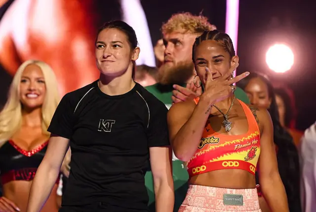 Katie Taylor standing alongside Amanda Serrano