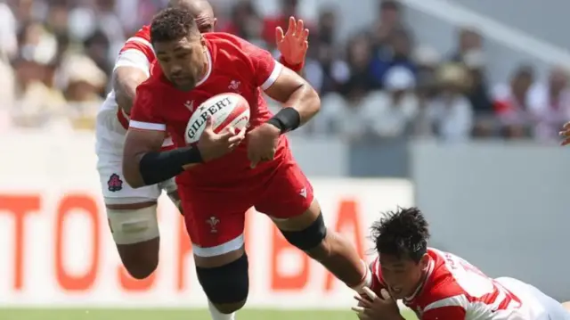 Taulupe Faletau carries the ball for Wales against Japan
