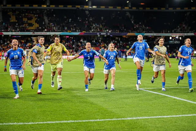 Italy players celebrate with their fans at full time