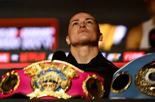 Katie Taylor looks to the sky during a press conference