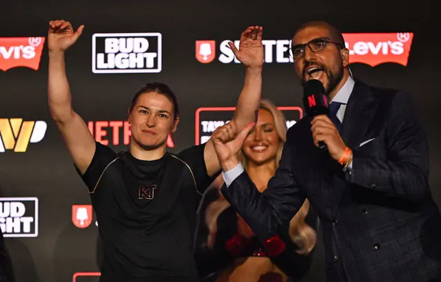 Katie Taylor with her hands up