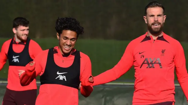 Jordan Henderson and Fabio Carvalho in Liverpool training