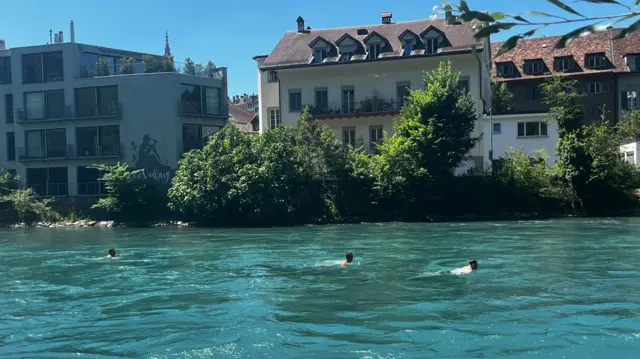 Swimmers in the river in Bern