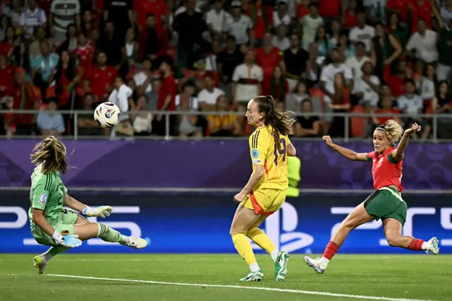 Lisa Lichtfus deflects the ball by Portugal's forward #21 Ana Capeta (R)