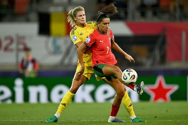 Justine Vanhaevermaet and Portugal's forward #07 Francisca Nazareth fight for the ball