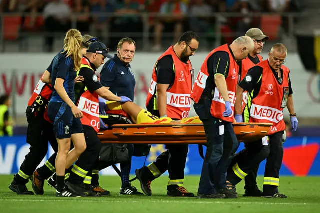 Jassina Blom is stretcherd off the pitch