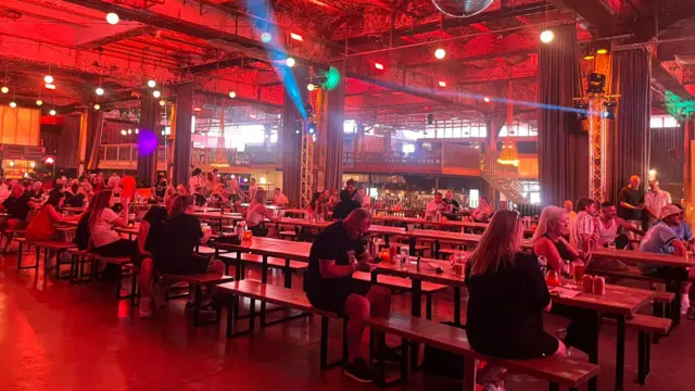 A wide shot of the inside of the event, not as busy as hoped.