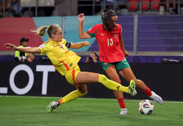Diana Gomes of Portugal is challenged by Tessa Wullaert