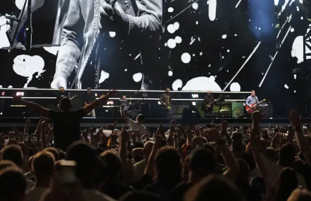 Oasis takes to the stage at the Principality Stadium, Cardiff, for the band's long-awaited reunion tour kicks off in Wales.