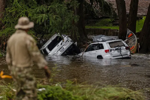 Cars submerged under water from floods