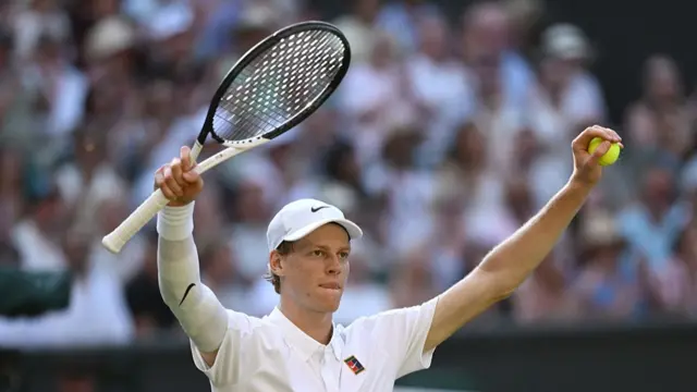 Jannik Sinner celebrates win against Novak Djokovic