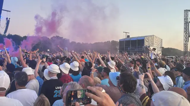 A wide shot of the crowd.
