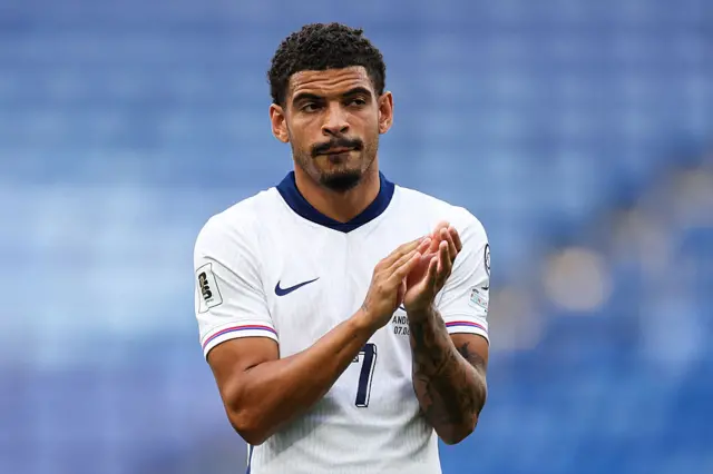 Morgan Gibbs-White clapping in an England shirt