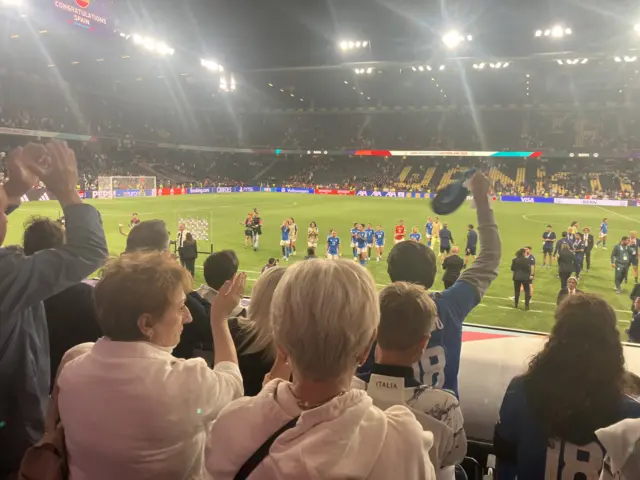 Italy families celebrate at full time