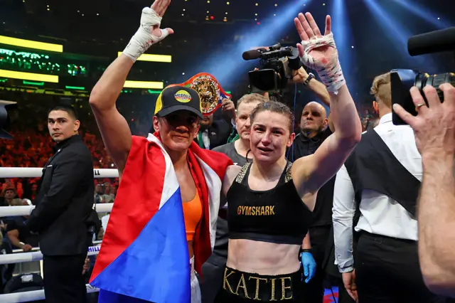 Amanda Serrano and Katie Taylor waving