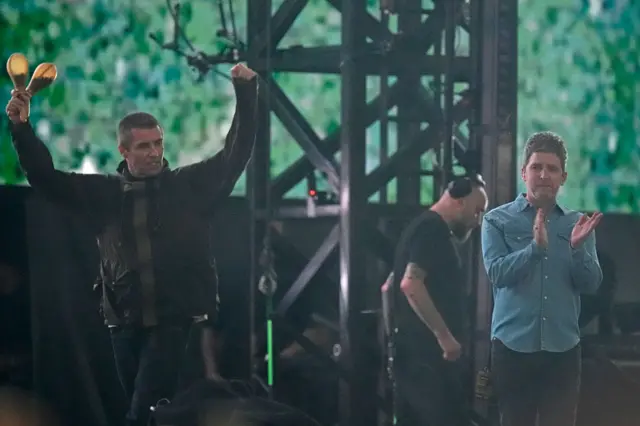 Liam and Noel Gallagher on stage in 2025