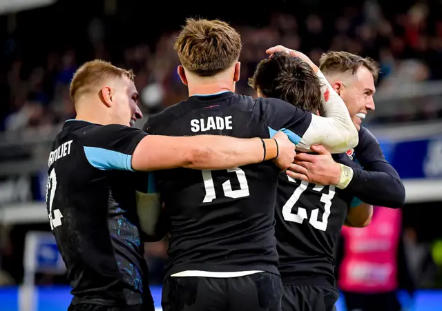 England celebrate a try against Argentina