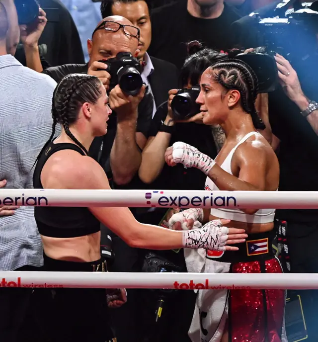 Katie Taylor and Amanda Serrano hug