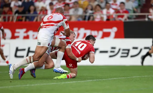 Wales' Dan Edwards scores a try