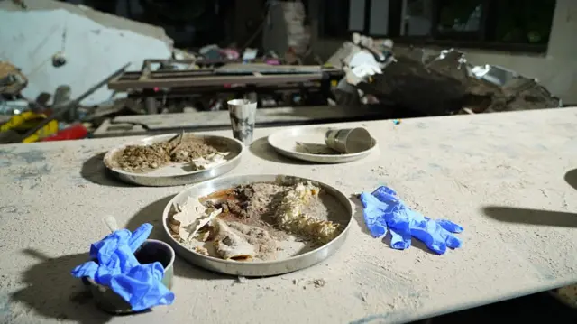 Plates with food at a dining hall of a medical school at the crash site of Air India Ltd. Flight AI171 in Ahmedabad, Gujarat, India, on Thursday, June 12, 2025.