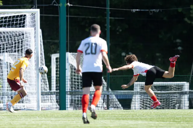 Clyde's Liam Scullion scores