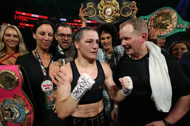 Katie Taylor celebrates with her fists closed