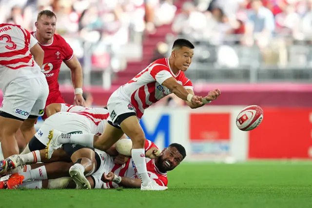 Japan's Naoto Saito throws the ball