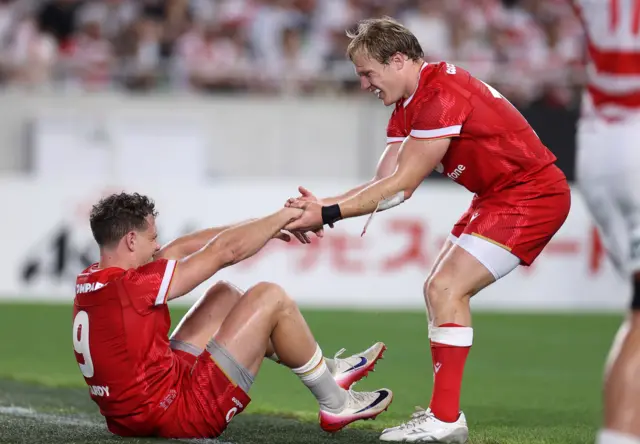 Wales' Kieran Hardy (left) celebrates with Blair Murray