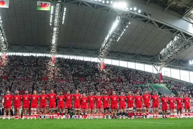 Wales players sing the anthem