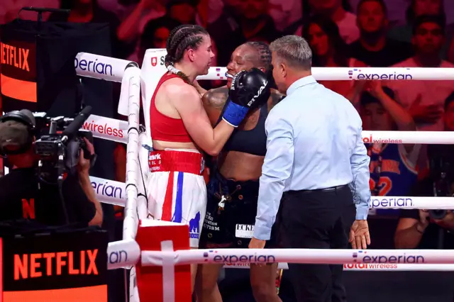 Savannah Marshall and Shadasia Green hug in the ring